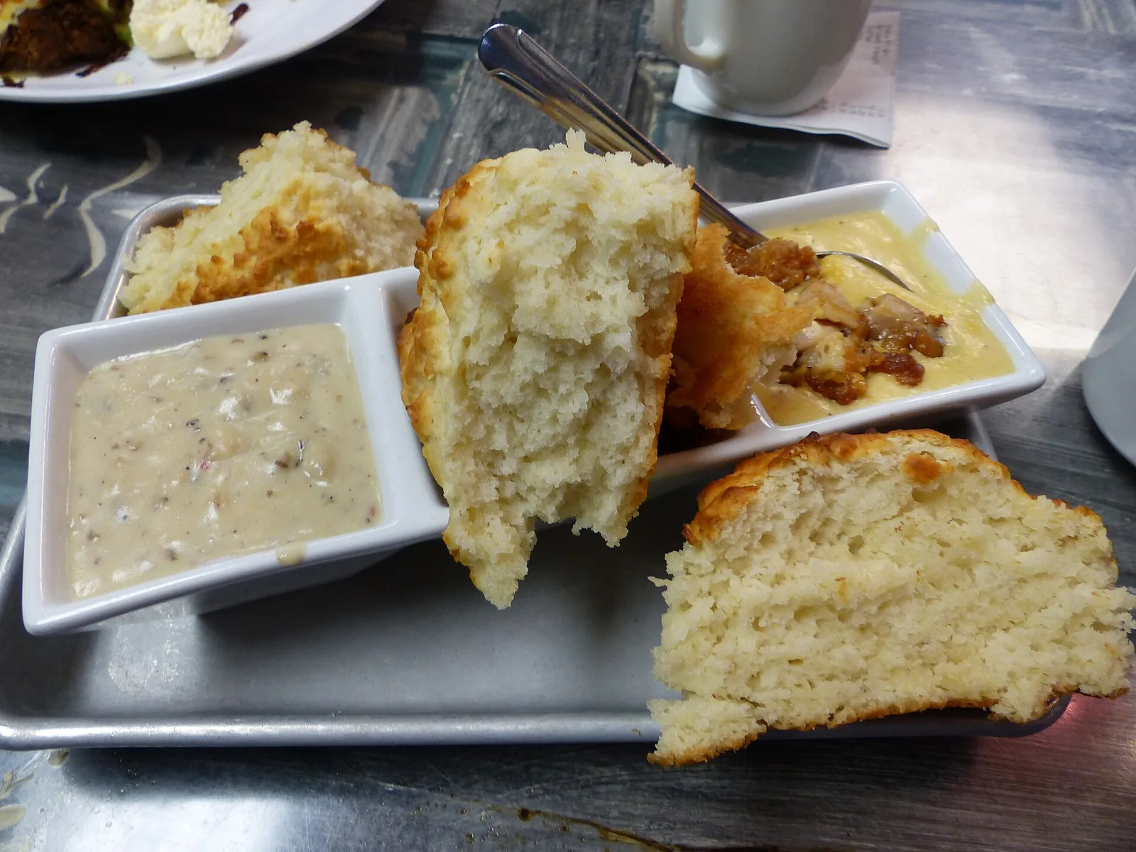 A flight of biscuits with different gravies at a breakfast restaurant in Asheville, N.C. The photo was not taken in Wake Forest.