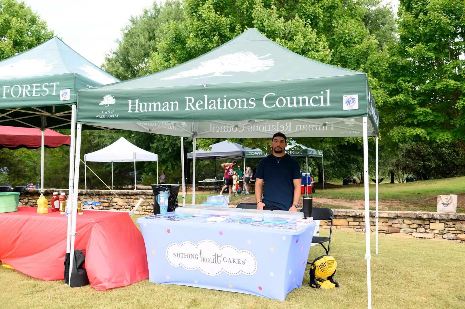 The Wake Forest Human Relations Council's tent at Good Neighbor Day in E. Carroll Joyner Park.